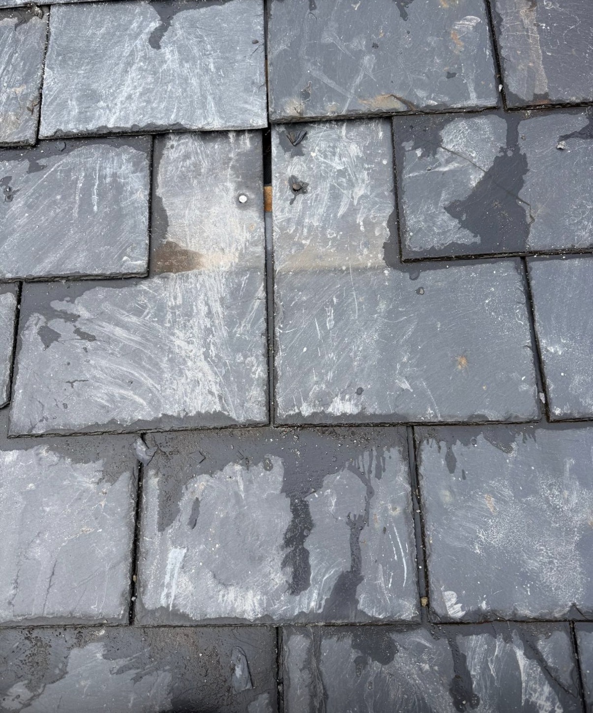 Slipped tile and flashing repair